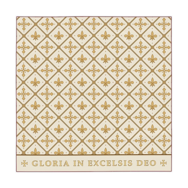 Cream-colored square tablecloth with a diagonal lattice pattern of alternating gold fleur-de-lis and ornate crosses, bordered by text reading 'Gloria in Excelsis Deo'