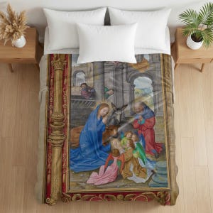 Plush blanket featuring a Nativity scene with Mary in blue robes, Joseph in red, baby Jesus, angels, and animals in an architectural setting with ornate gold and red decorative borders, displayed on a bed with white pillows