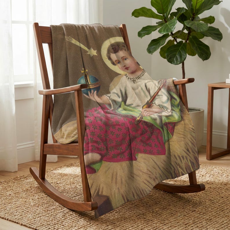Christmas plush blanket draped over a wooden rocking chair