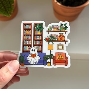 Cute Ghostie Reading Sticker with a Bookshelf, Fall Reading Sticker, Kindle Sticker, Halloween Bookish Sticker, Ghost Autumn Reader Sticker