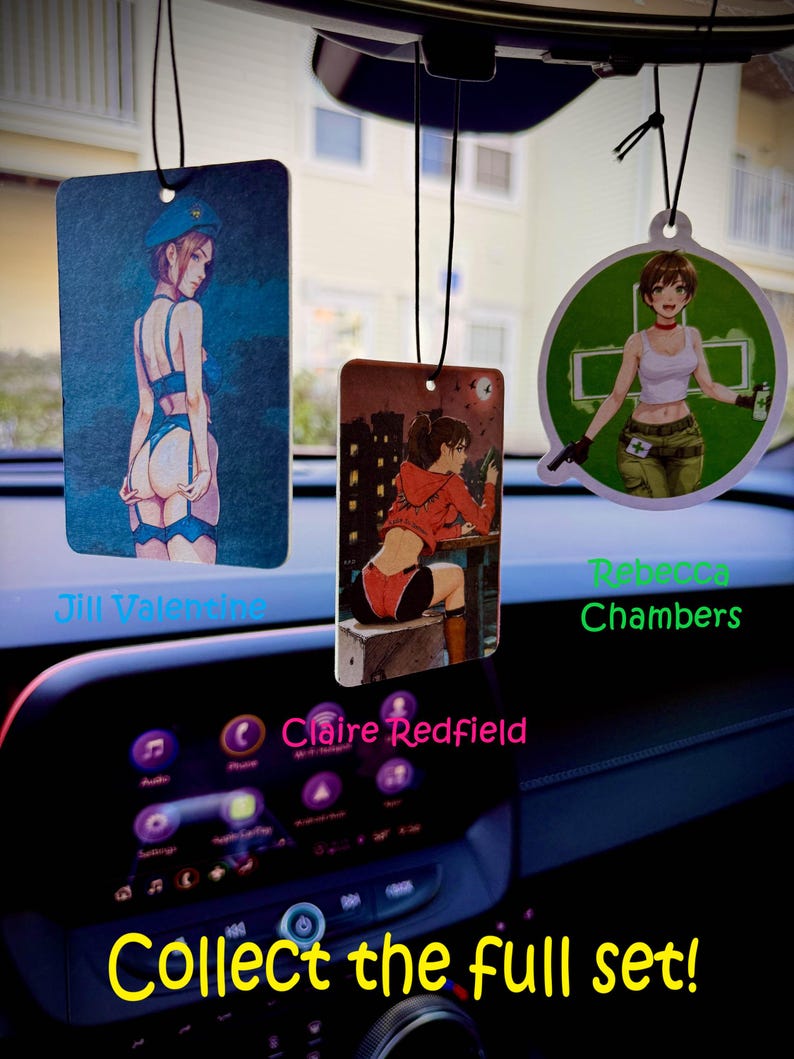 May include: Three car air fresheners featuring anime-style illustrations of female characters. One is a rectangular shape with a woman in blue lingerie, another is rectangular with a woman in an orange jacket, and the last is a circular shape with a woman in a white tank top. Text reads "Collect the full set!"
