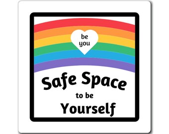 May include: A rainbow-coloured arch with a white heart in the centre that says "be you". Below the arch is the text "Safe Space to be Yourself".