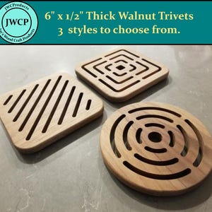 May include: Three walnut trivets, each with a unique design, are displayed. The trivets are 6" x 1/2" thick and feature a rectangular shape with diagonal lines, a square shape with a geometric pattern, and a circular shape with concentric circles. The text reads "6" x 1/2" Thick Walnut Trivets 3 styles to choose from."