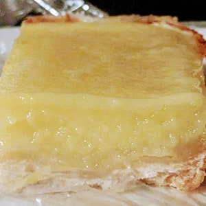 Lemon Bars with Real Lemon Juice topped with Powdered Sugar