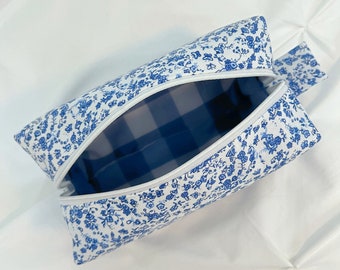 Blue and white floral makeup/cosmetic bag with blue gingham lining