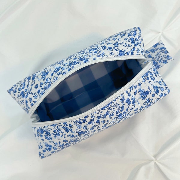 Blue and white floral makeup/cosmetic bag with blue gingham lining