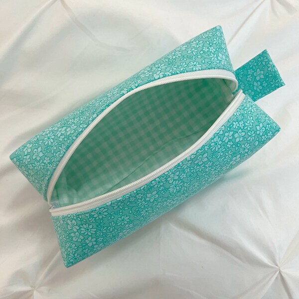 Teal floral makeup/cosmetic bag with teal gingham lining