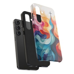 May include: A black phone case with a colorful abstract design featuring a cross. The design is made up of swirls and lines in shades of blue, red, yellow, and orange.