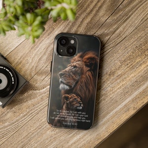 May include: A phone case with a lion and a lion cub on a dark background. The case has a quote from Isaiah 41:10, "So do not fear, for I am with you; do not be dismayed, for I am your God. I will strengthen you and help you; I will uphold you with my righteous right hand."