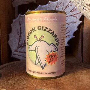 May include: A vintage-style can of pigeon gizzards, labeled "The Sensible Wizards Pigeon Gizzards 2sp Proudly Packed in Faerun". The can features a cartoon illustration of a pigeon with its head upside down.
