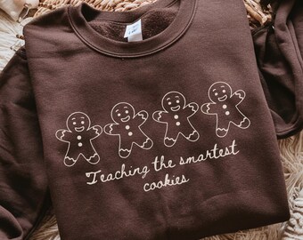 Teaching The Smartest Cookies Sweatshirt, Christmas Teacher Sweatshirt, Cute Gingerbread Teacher Crewneck, Holiday School Gift for Educators