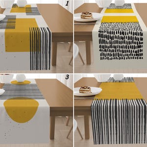 May include: Four table runners with abstract geometric patterns in yellow, black, and white. Each runner has a unique design, including rectangles, lines, and a half-circle. Ideal for adding a modern touch to a dining table.