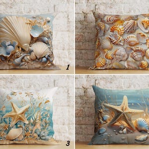 May include: Four decorative throw pillows with coastal themes. Designs include seashells, starfish, and underwater scenes in shades of beige, blue, and white. The pillows are square-shaped and likely made of fabric.