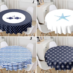 May include: A set of four round tablecloths featuring nautical designs. One is navy with white polka dots and two fish, one is white with a blue starfish, one has blue and white horizontal stripes, and one is navy with a white compass rose pattern.