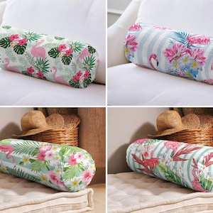 May include: A set of four cylindrical bolster cushions featuring various tropical patterns. The designs include pink flamingos, green palm leaves, white and pink hibiscus flowers, and light blue or white vertical stripes on the fabric covers.