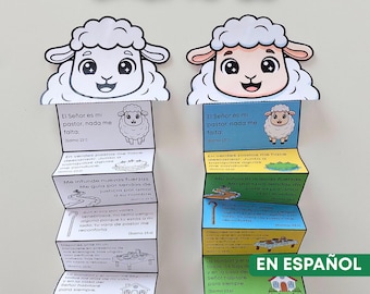 May include: Two colorful, folded paper crafts shaped like sheep, featuring text from Psalm 23 in Spanish. The crafts have a cartoon sheep face at the top and include illustrations and text. The words "SALMO 23" are prominently displayed.
