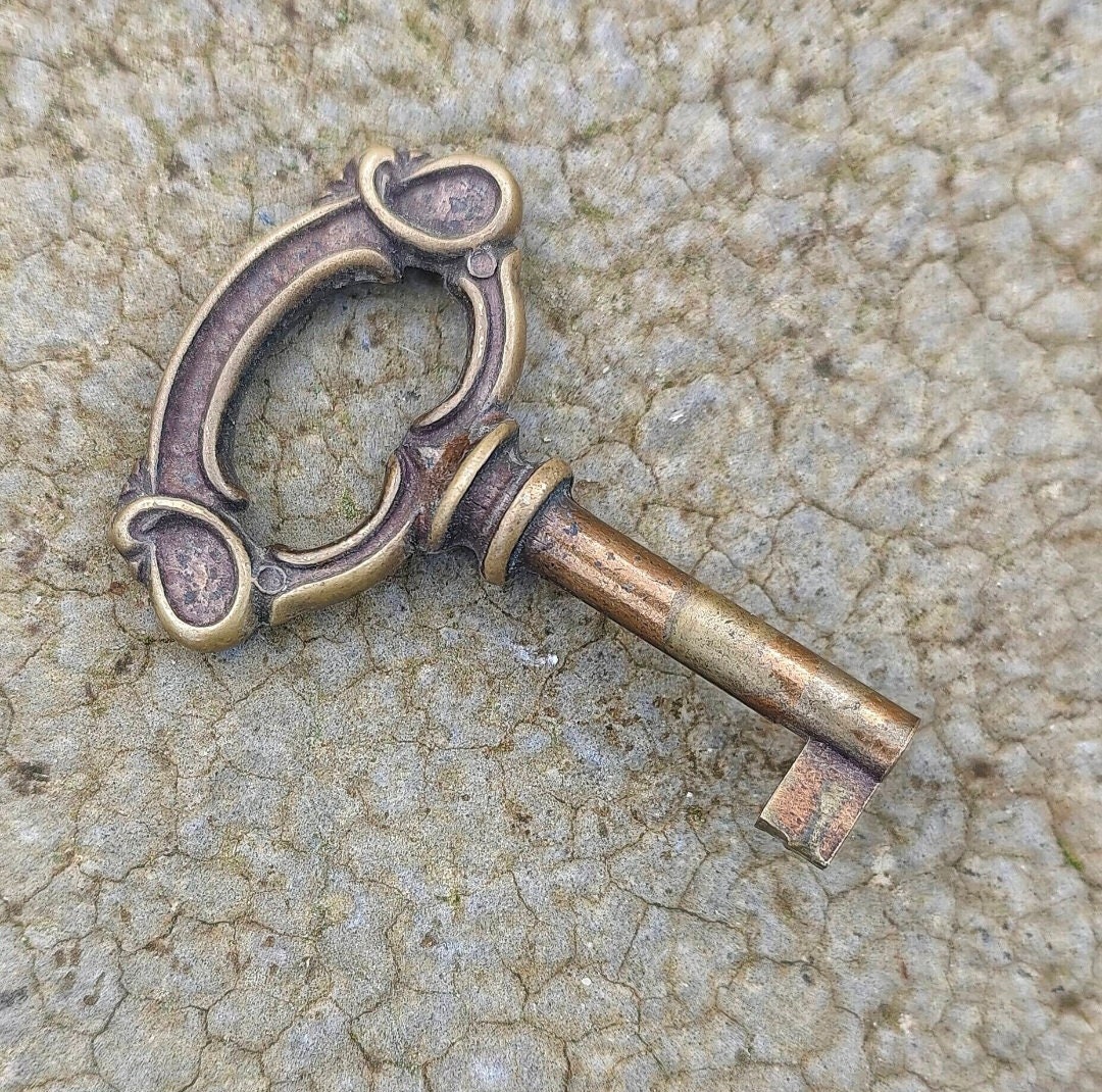 Old brass key Skeleton key for vintage furniture