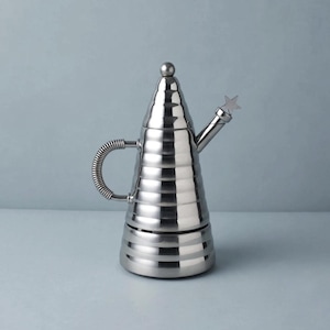 May include: A stainless steel coffee maker with a conical, ribbed body and a spherical finial on the lid. It features a coiled metal handle and a spout topped with a small, five-pointed star ornament. The metallic surface has a polished finish.