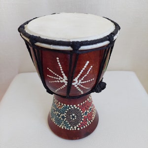 handmade musical instrument Dgembe small bongo drum