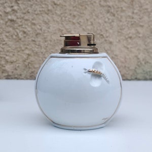 table lighter in fine artistic porcelain "CARPIE'.