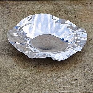 Vintage Alessi Coupe centerpiece in free-form steel. Modern metal fruit confetti plate