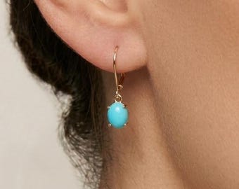 Pendientes colgantes de turquesa hechos a mano, bañados en oro de 14 quilates y plata de ley.