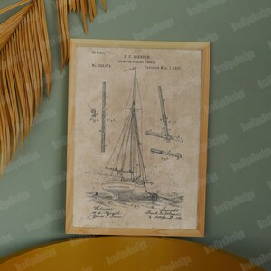 Könnte beinhalten: Eine gerahmte Vintage-Patentzeichnung eines Segelboots mit dem Text "F. S. BARBER, Sail for the Sailing Canoe, No. 530975, Patented Nov. 1, 1894".