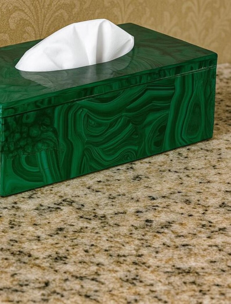 Decorative malachite tissue holder with swirling emerald green mineral design