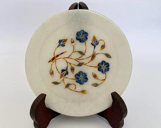 Modern white marble trinket or dessert plate with subtle veining, 6 inches across.