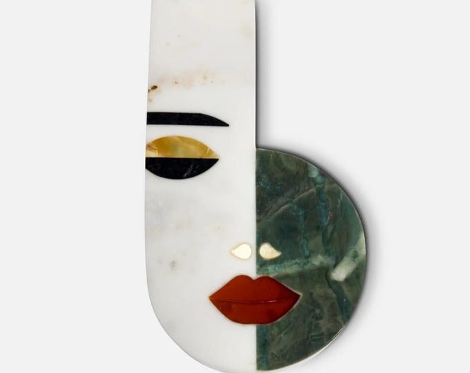 Marble or Stone Artwork Featuring a Modern Abstract Face Design Combining Different Colored Stones
