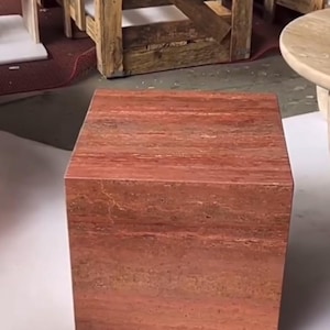 Red travertine cube pedestals and side tables combine natural beauty with functional design side table