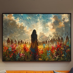 May include: An orange tufted sofa with cushions in grey, orange, and blue. Above the sofa is a framed painting of a figure in a field of flowers under a cloudy sky. A round black coffee table and a grey ottoman are in front of the sofa.