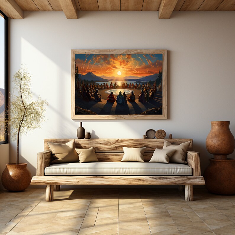 May include: A framed painting of a group of people sitting in a circle around a body of water, with a sunset in the background. The painting is hanging on a wall in a living room with a wooden couch and a potted plant.