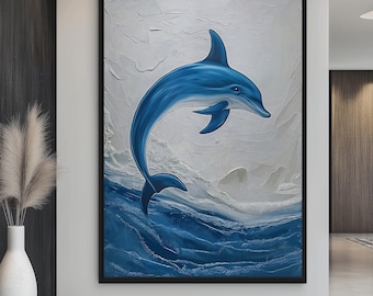 May include: A blue dolphin leaping out of the water, painted on a white canvas with blue and white waves. The painting is framed in black.