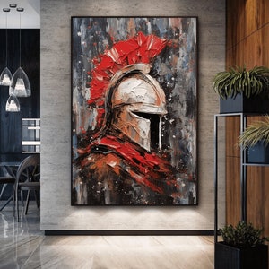 May include: A painting of a warrior's helmet with a red plume. The helmet is painted in a white and brown color scheme, with a black visor. The background is a dark gray with splashes of red and white paint.
