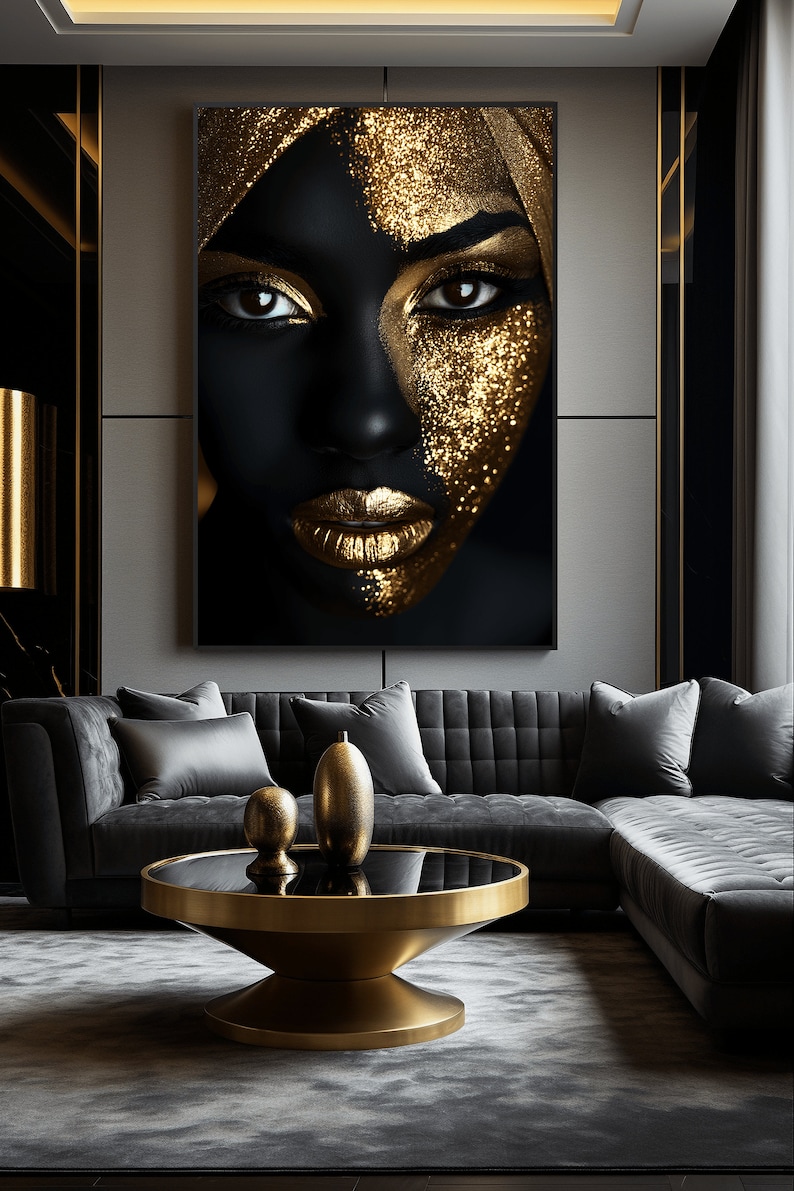 May include: An abstract portrait of a woman's face in black and gold with glitter makeup. The portrait is framed and hanging on a wall in a modern living room.
