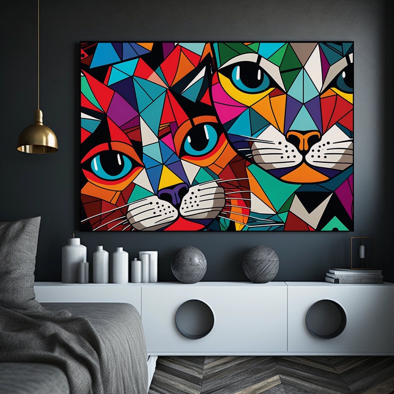 May include: Abstract geometric painting of two cats with colorful, triangular patterns. The cats have blue eyes and are looking directly at the viewer.
