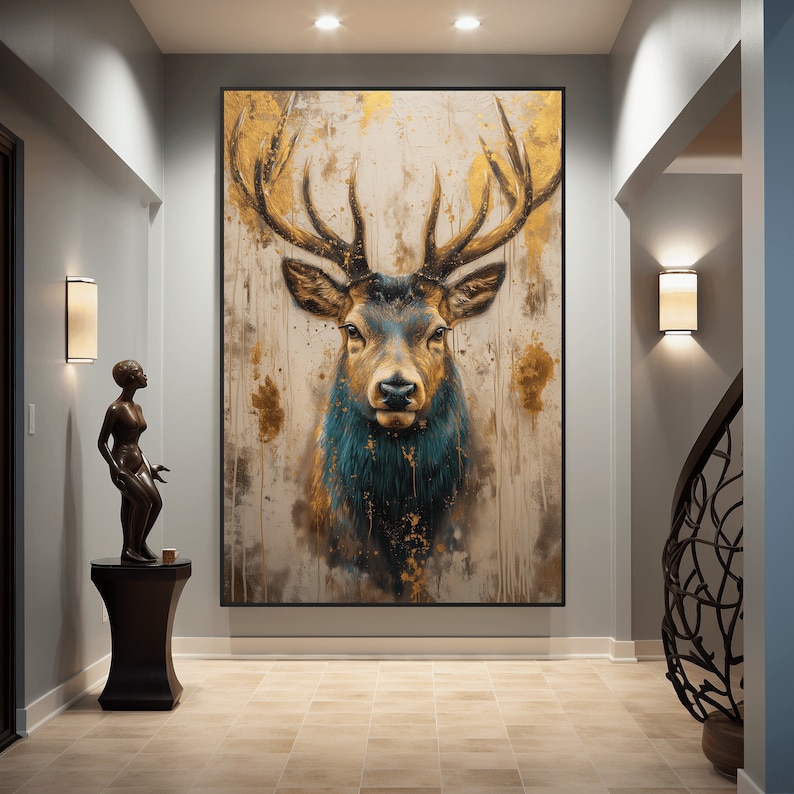 May include: A large canvas print of a golden stag with a blue and green patterned coat. The stag is set against a background of gold and white paint splatters.