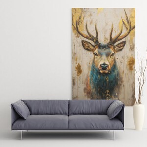 May include: A painting of a deer's head with large antlers. The deer has a blue and brown coat with gold accents. The background is a light gray with gold splatters.