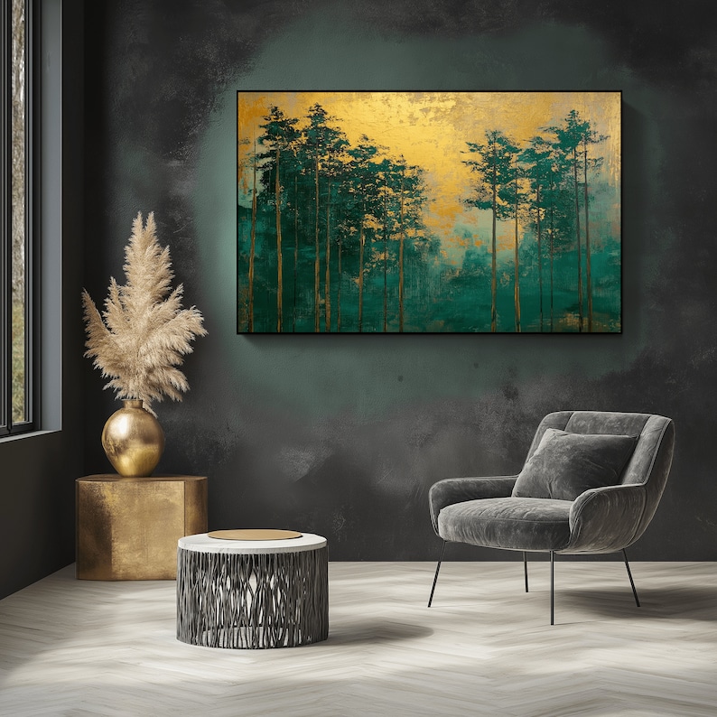 May include: An abstract landscape painting featuring tall, slender trees in shades of emerald green and gold. The artwork is framed in black and hangs on a dark teal wall. The painting evokes a sense of nature and tranquility.