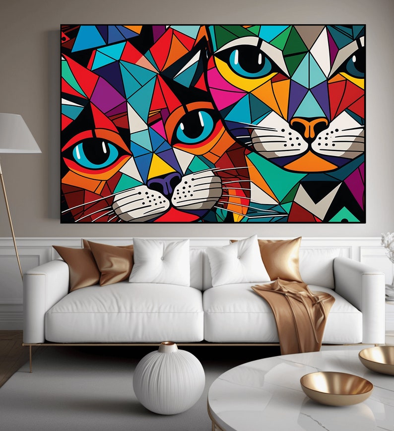 May include: Abstract geometric painting of two cats with colorful triangular patterns. The cats have blue eyes and are looking directly at the viewer.