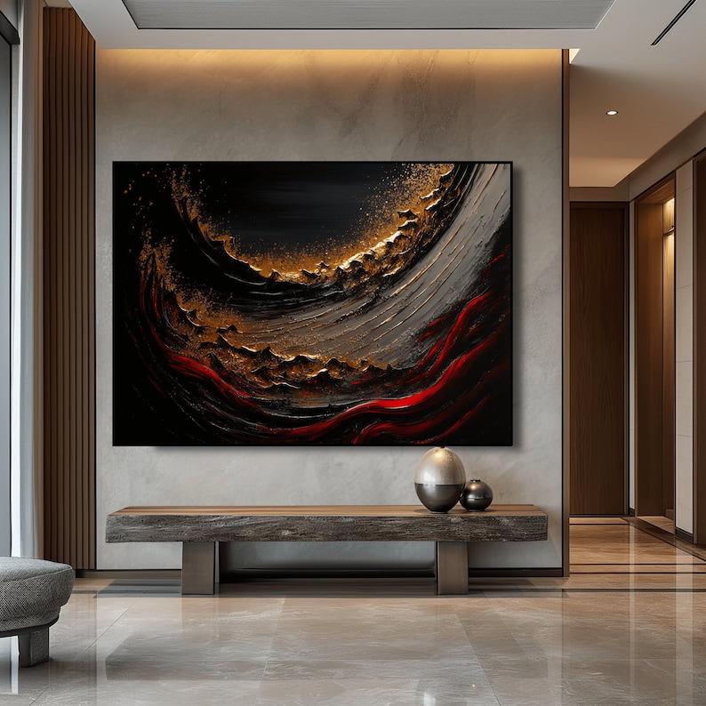 May include: Abstract painting with black, gold, and red colors. The painting features a swirling, textured design with a dark background and gold and red accents.