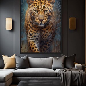 May include: A framed artwork featuring a detailed painting of a leopard. The leopard has a spotted coat in shades of brown and black, with a focused gaze. The artwork is displayed above a gray sectional sofa with decorative pillows.