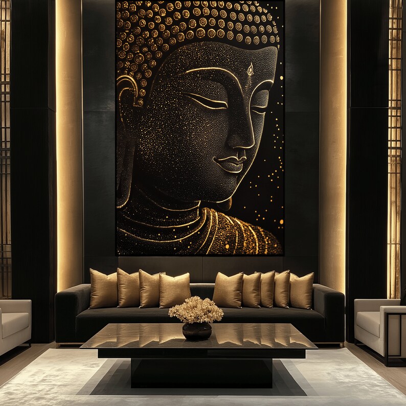 May include: A large, black and gold Buddha wall art print. The Buddha's face is in profile, with closed eyes and intricate gold detailing. The artwork is displayed above a dark gray sofa with gold pillows, a black coffee table, and a light gray rug.