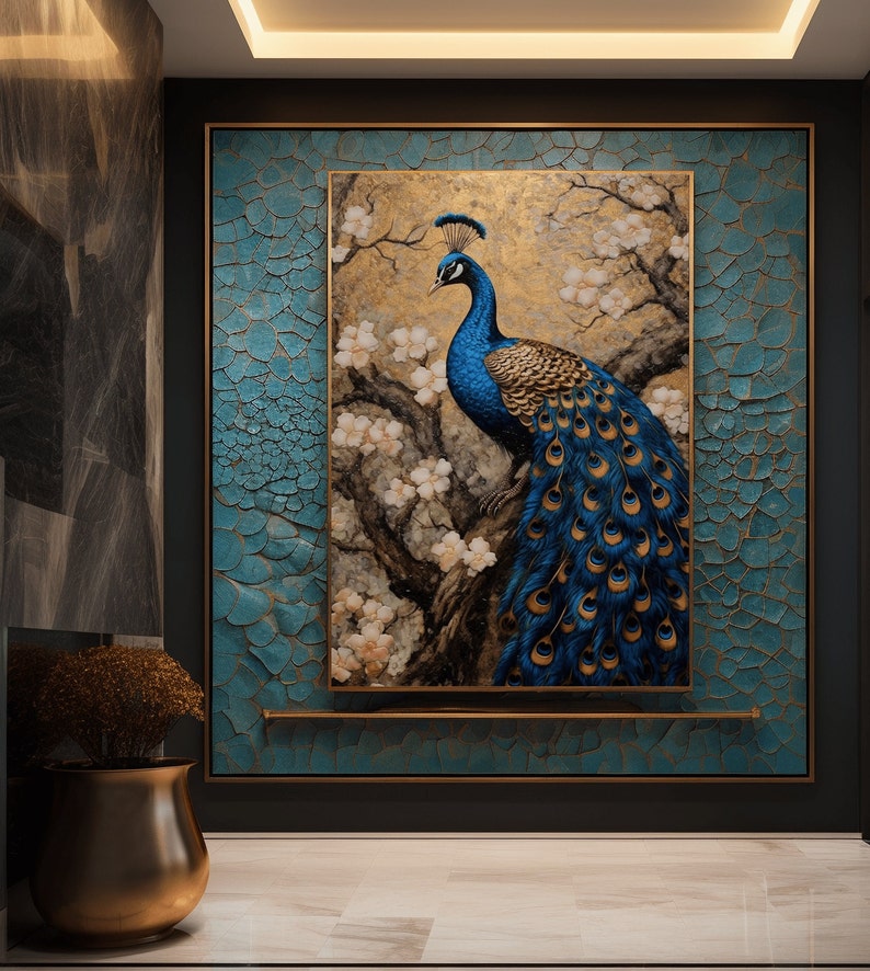 May include: A framed painting of a blue peacock with its tail feathers spread out. The peacock is perched on a branch of a tree with white blossoms. The background is a gold and brown color.