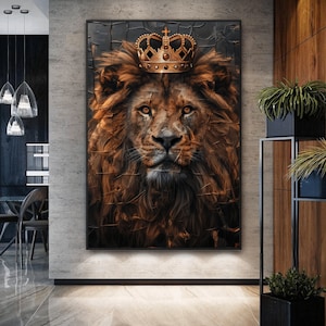 May include: A close-up of a lion's face with a gold crown on its head. The lion has a serious expression and its fur is a rich brown color.