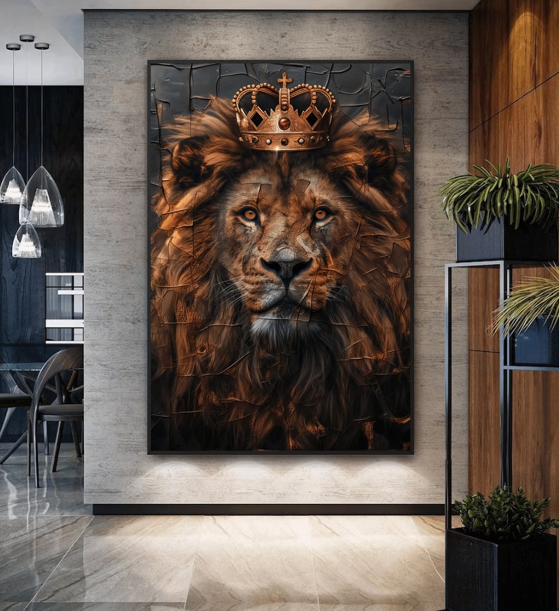 May include: A close-up of a lion's face with a gold crown on its head. The lion has a serious expression and its fur is a rich brown color.