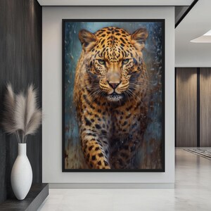 May include: A framed art print of a leopard, featuring a detailed portrait of the animal. The leopard has a spotted coat in shades of brown and black, with a focused gaze. The background has blue and brown tones.