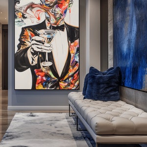 May include: A hallway with a white rug, a white leather bench with blue pillows, and a large framed painting of a man in a tuxedo holding a martini glass. The painting is colorful and abstract.