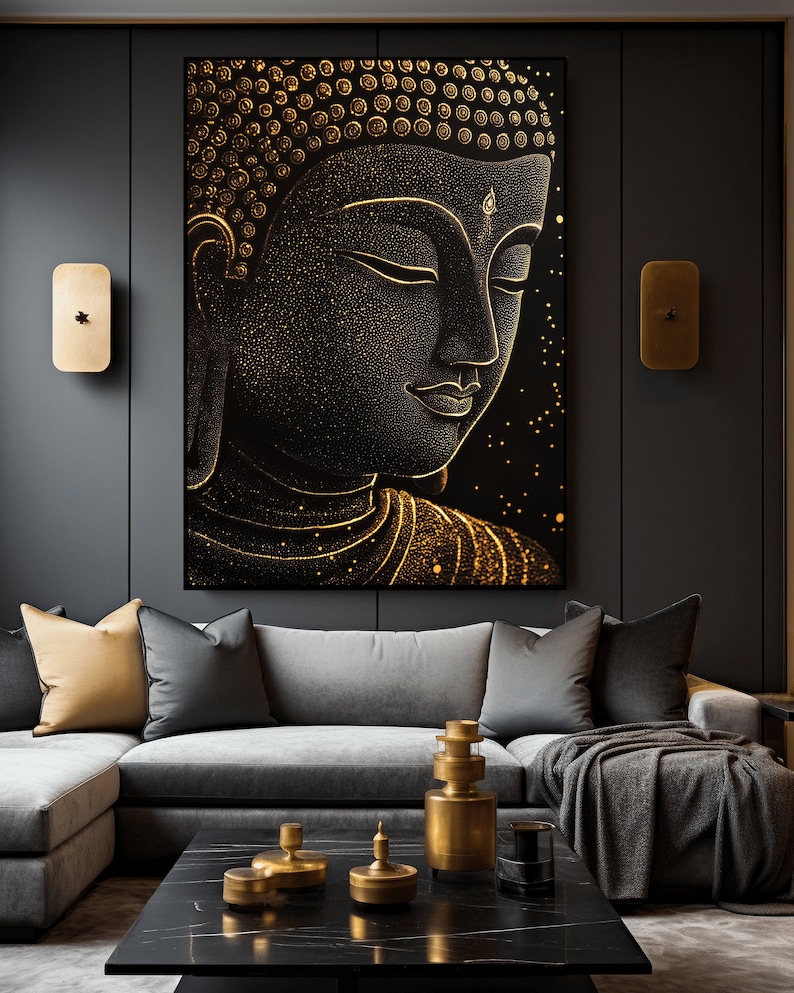 May include: A large, framed artwork featuring a detailed, gold-toned depiction of Buddha's face against a black background. The artwork is displayed above a gray sectional sofa with decorative pillows and a black marble coffee table with gold accents.